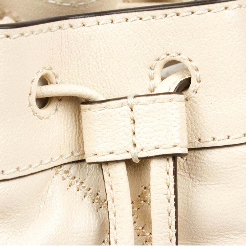 Tory Burch 菱格紋羊皮抽繩水桶包單肩斜挎包 87869-724