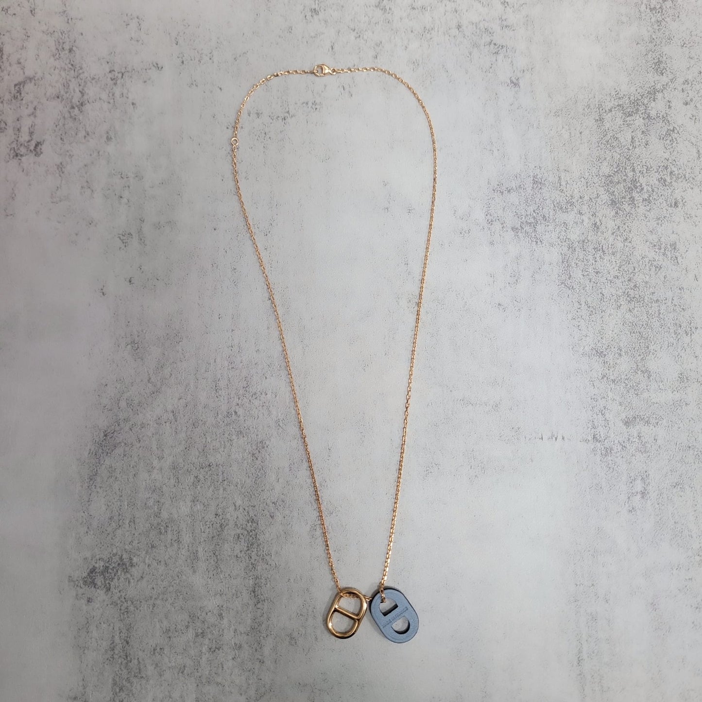 Hermes O'Maillon pendant leather and metal pig nose light blue gold necklace